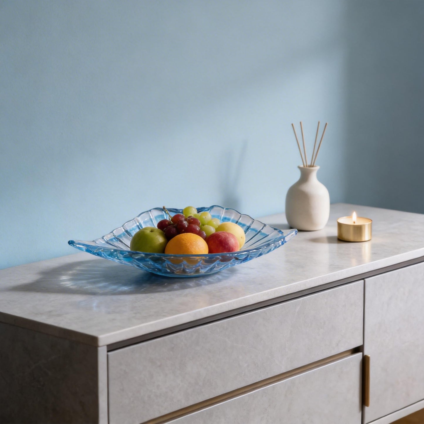 DOVDOV Hand blown decorative glass bowls, Blue large glass fruit bowls, and serving platters perfect for display on coffee tables, dining tables, kitchen countertops, TV stands, and entryway shelves.