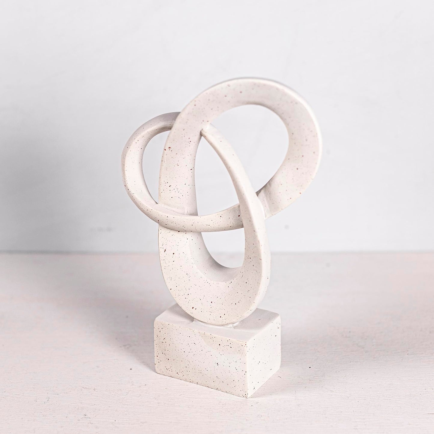 WeiRanHuiWu Abstract Interlocking Rings Sculpture, White Speckled Resin, 9.45in Tall, Modern Decor on Square Base
