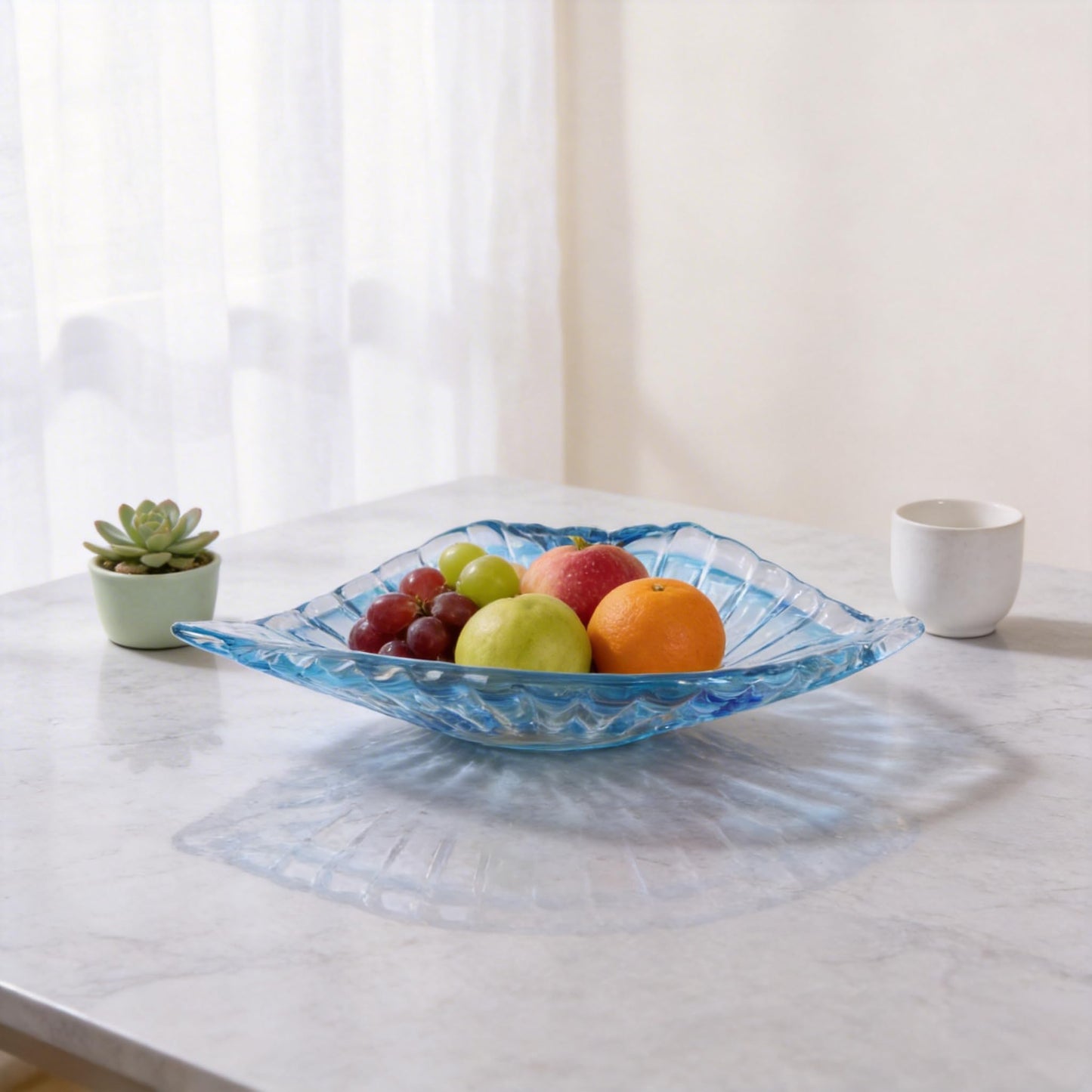 DOVDOV Hand blown decorative glass bowls, Blue large glass fruit bowls, and serving platters perfect for display on coffee tables, dining tables, kitchen countertops, TV stands, and entryway shelves.