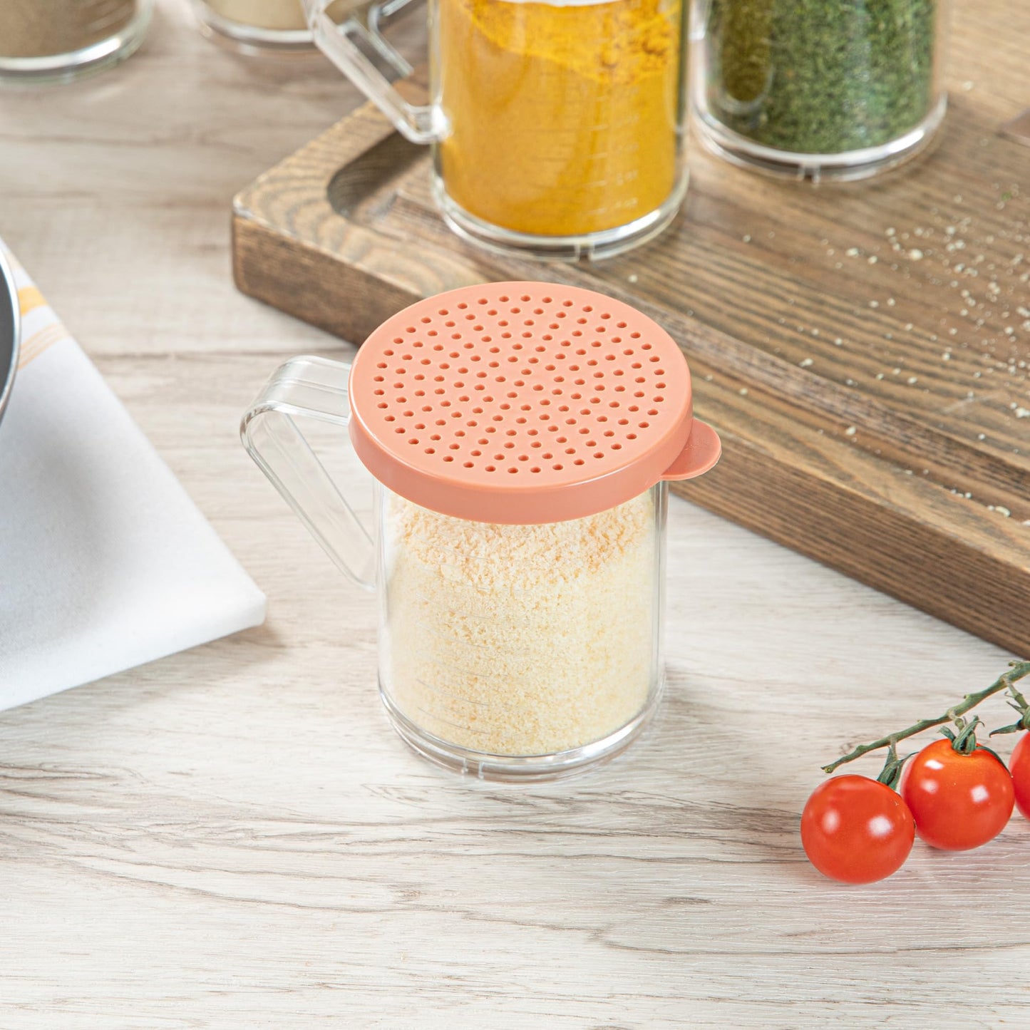 Restaurantware RW Base 10 Ounce Clear Plastic Dredge Spice Shaker 1 Reusable Dry Rub Shaker - Includes Rose Perforated Lid With Handle Clear Polycarbonate Spice Shaker For Any Seasoning